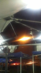 Torn and stripped canopy frames fo Lowing the strong winds this evening (June 27).