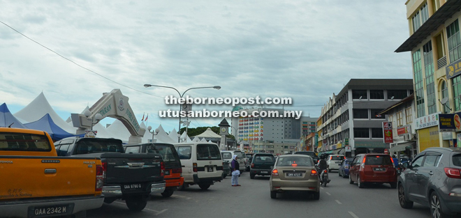 The new Limbang town commercial area is congested with limited parking space.