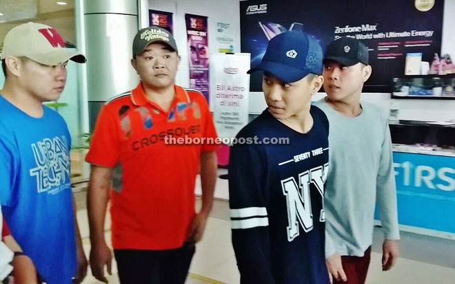 (From left) Teck Chii, Hung Sing, Johnny Lau and Teck Kang arrive at Sibu airport.
