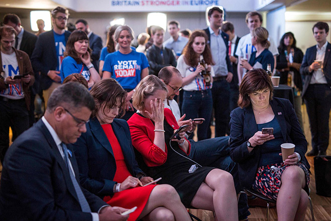 Supporters of the ‘Stronger In’ Campaign react as results of the EU referendum are announced at  party at the Royal Festival Hall in London. Bookmakers dramatically reversed the odds on Britain leaving the European Union on Friday as early results from a historic referendum pointed to strong support for a Brexit. — AFP photo