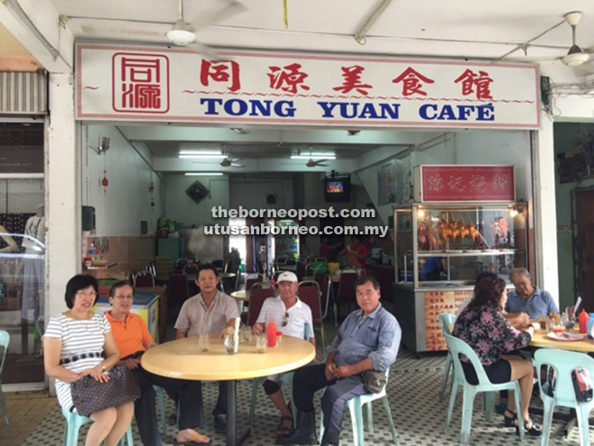 (From left) Mr and Mrs Wong Huang Hoo, Tiong and customers. 