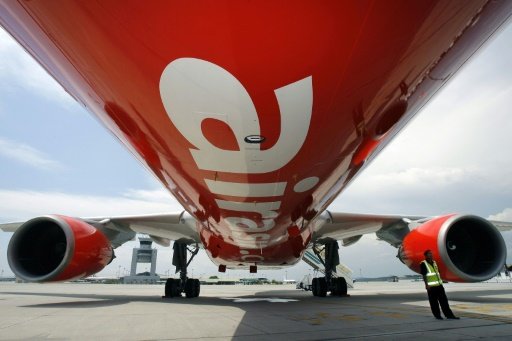 In 2015, Thai Air Asia carried 14.8 million passengers and plans to serve 16.9 million travellers this year. -AFP Photo