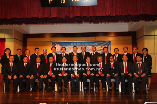 (Seated from fifth left) Lau, Tiong and the new office-bearers. 