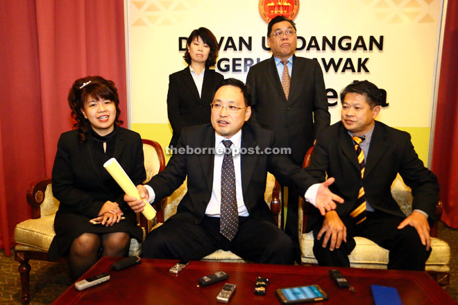 Chong gestures at the press conference. With him are Yong (seated left), Dr Ting (seated right), Chang and Chiew.