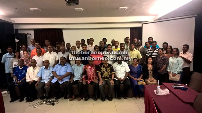 Jothi (seated sixth left) and the MIC Lahad Datu members.