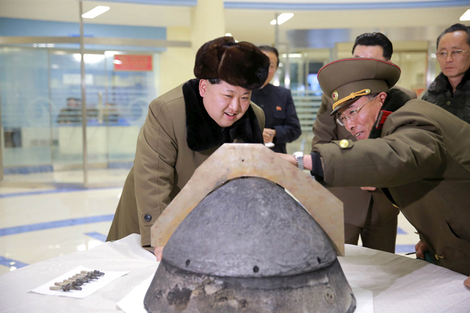 The file picture shows Kim looks at a rocket warhead tip after a simulated test of atmospheric re-entry of a ballistic missile, at an unidentified location in this undated photo released by North Korea’s Korean Central News Agency (KCNA) in Pyongyang. — Reuters photo