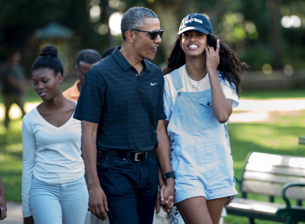 US President Barack Obama and his daughter Malia Obama walk during a visit to the Honolulu Zoo January 2, 2016 in Honolulu, Hawaii. Photo by AFP