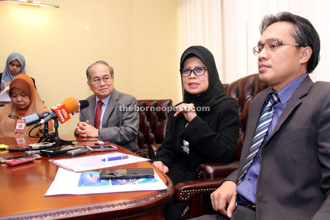 Fatimah (second left) addresses the press conference. Also seen are Uggah (left) and Razi. — Photos by Chimon Upon