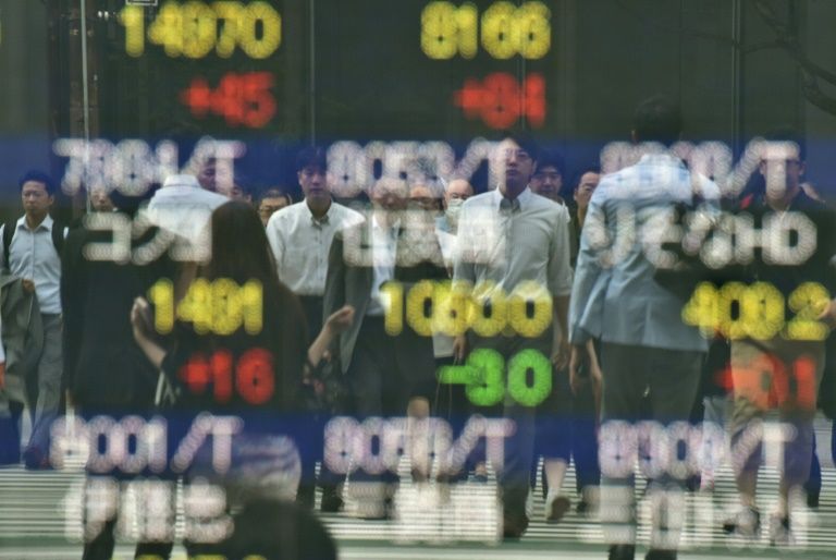 As the shock results of the UK referendum rolled in on June 24, 2016, equity markets in Asia went into meltdown, wiping hundreds of billions of dollars off shares. Photo by AFP