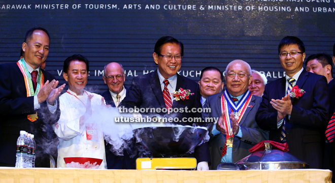 Lee (fourth left) officially launches the event. Yan is at second left, while Goh is at front second right.