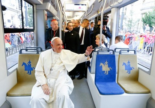 Pope Francis waves to faithfuls as he rides a tram to Blonia Park on July 28, 2016 in Krakow to open the World Youth Days (WYD) -AFP photo