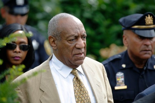Comedian Bill Cosby departs the Montgomery County Courthouse after a hearing, related to aggravated indecent assault charges, in Norristown, Pennsylvania, on July 7, 2016. - AFP Photo