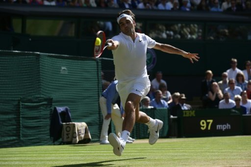 Switzerland's Roger Federer in action against Croatia's Marin Cilic in the Wimbledon quarter-finals on July 6, 2016 -AFO photo