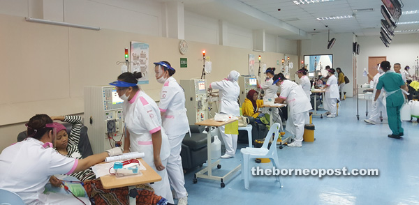 Patients undergo dialysis, with help and support from the nurses. 