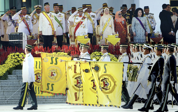 Tuanku Abdul Halim, Tuanku Hajah Haminah and other dignitaries at the trooping of the colours ceremony at Dataran Pahlawan Negara in Kuala Lumpur. — Bernama photo