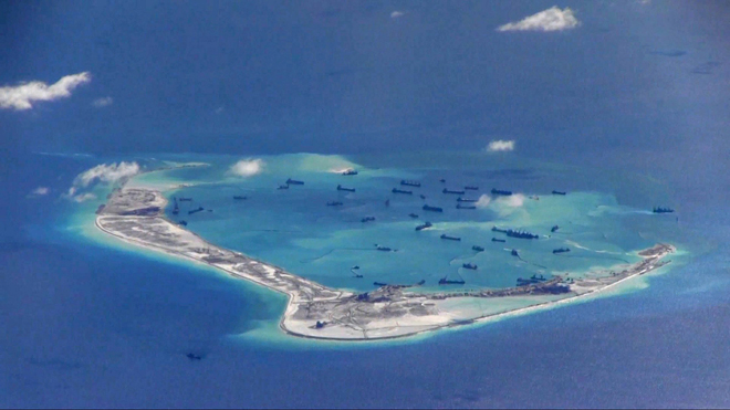 Chinese dredging vessels are purportedly seen in the waters around Mischief Reef in the disputed Spratly Islands in the South China Sea in this still image from video taken by a P-8A Poseidon surveillance aircraft provided by the United States Navy May 21, 2015 file photo. — Reuters photo