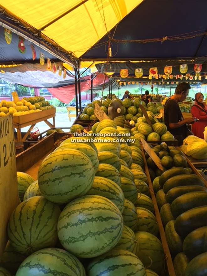 Watermelons and honeydews at the market of Sipitang. 