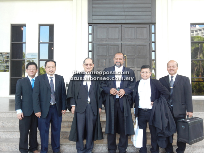 Gobind (third right) posing with (from left) Tan, Chieng Jen, Siew Chiang and others after the proceeding yesterday. 