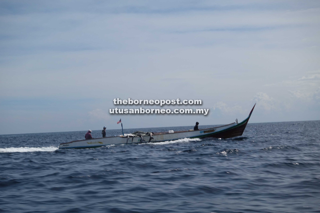 This photo of a boat ferrying dead sharks was taken by a tourist from Sweden in waters near Pulau Mabul in Semporna on July 22, and later shared with the Sabah Shark Protection Association.