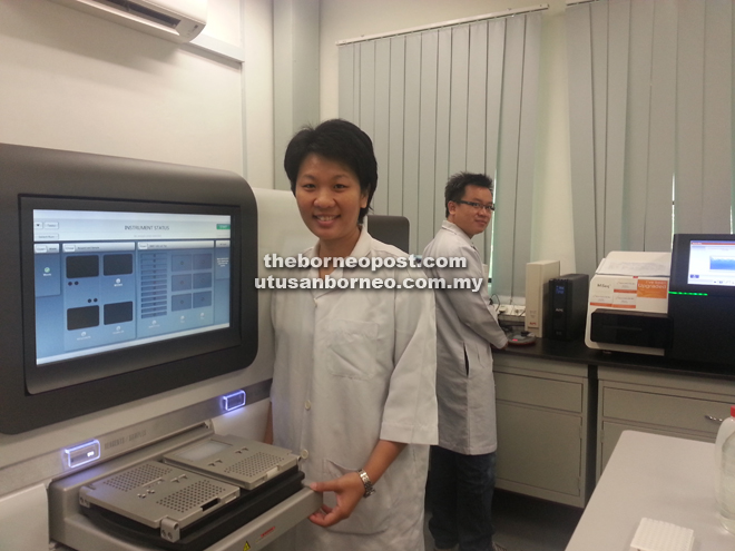 Students working with the PacBio and MiSeq Sequencers used in the study.