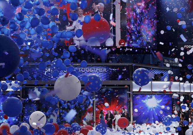 Hilary and Bill Clinton celebrate amidst balloons after she accepted the nomination on the fourth and final night at the Democratic National Convention in Philadelphia, Pennsylvania. — Reuters photo