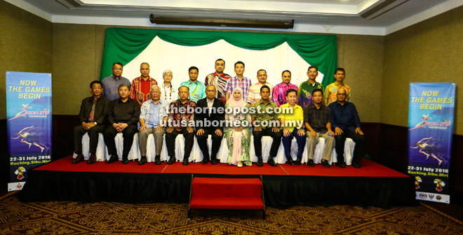 Adenan (seated fifth from left), Jamilah (seated sixth from left), other VIPs and key officials of various contingents in a special photography session before the dinner. — Photos by Mohd Rais Sanusi