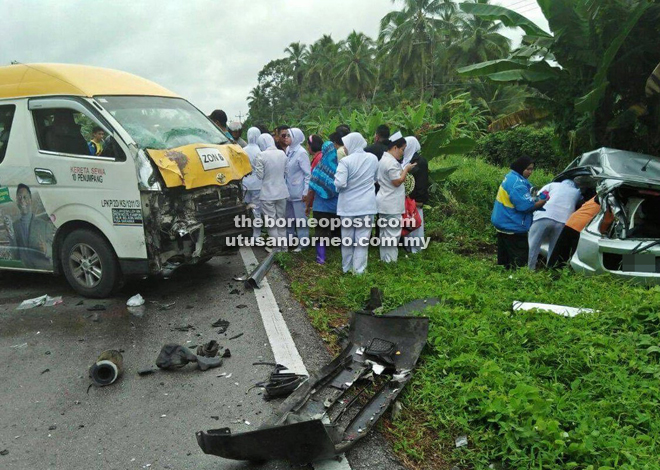 Nurses and members of the public are seen at the scene of the accident.
