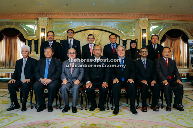 Adenan (seated centre) poses for a group photo with the Recoda Board of Directors before the meeting.