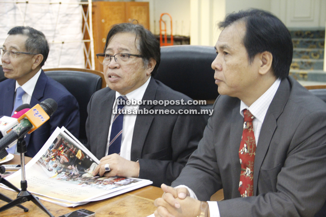 Abang Johari (centre) speaking to reporters yesterday. On his left is Dr Jerip (File photo).