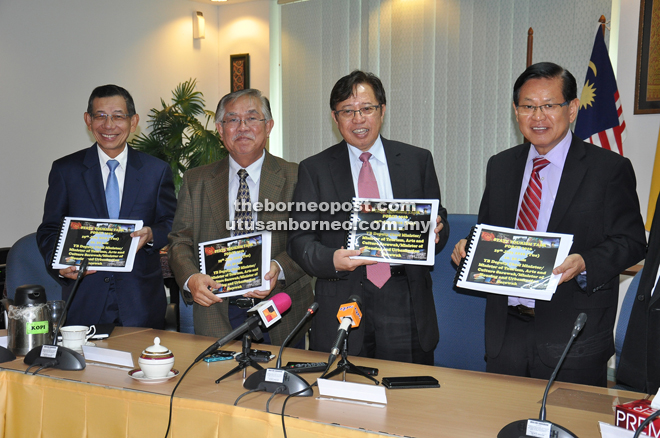 (From left) Ismawi, Sikie, Abang Johari and Lee show the State Tourism Task Force Committee proposal after the first meeting yesterday.