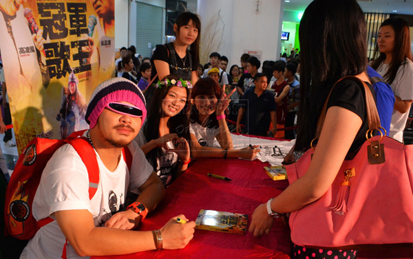 Namewee (left) poses for a photo in this file picture.