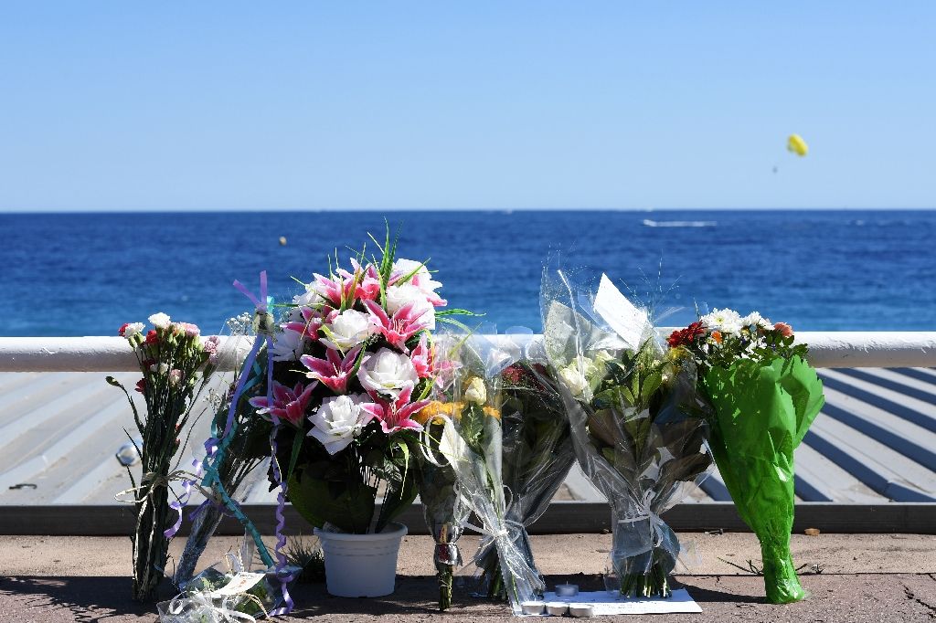 The Promenade des Anglais in Nice with flowers in tribute to the victims of the deadly Bastille Day attack. Photo by AFP