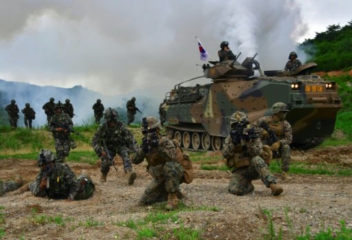 South Korea and US Marines take part in a joint military drill at a fire training field in the southeastern port of Pohang. Photo by AFP