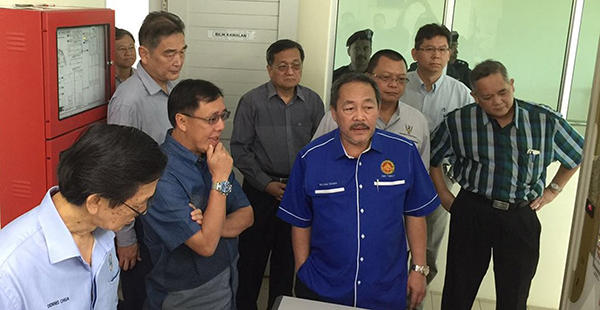 (From second left) Public Utilities Minister Datuk Dr Stephen Rundi Utom, Sagah and Bukit Semuja assemblyman John Ilus (behind Rundi) with officials from JBALB during a site visit to Slabi Water Treatment Plant. Serian Resident Dahim Nadot is behind Sagah.