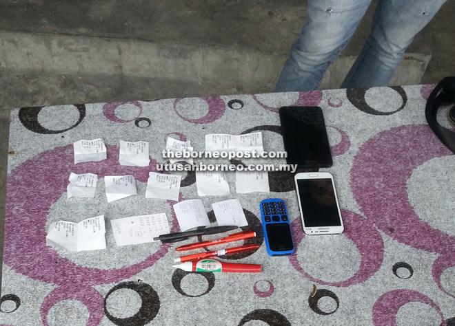 Illegal lottery paraphernalia seized during one of the raids. 