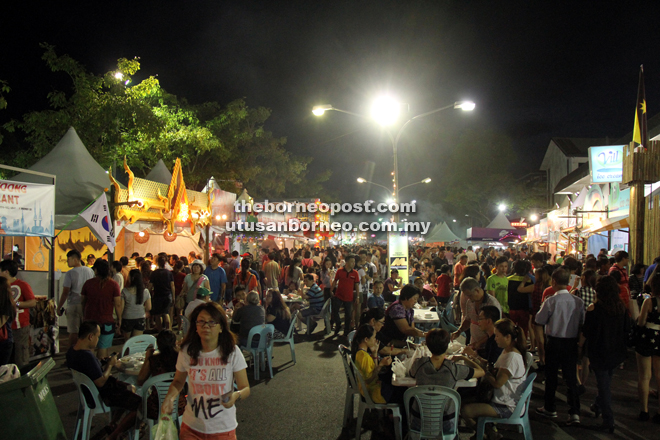People pack the Kuching Festival ground to have a good time over good food and entertainment. — Photo by Chimon Upon.
