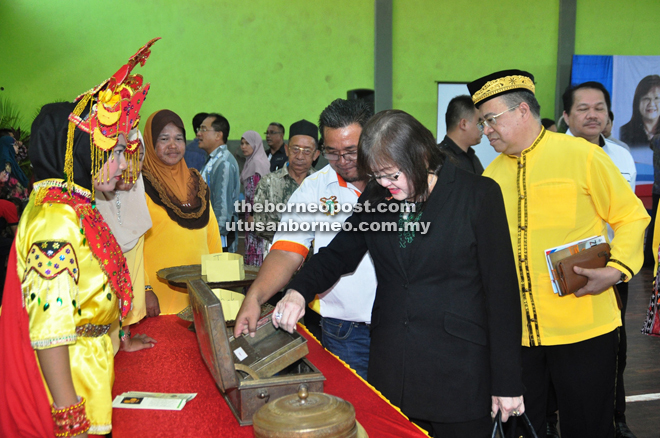 Mary (second right) visiting the exhibition booths.