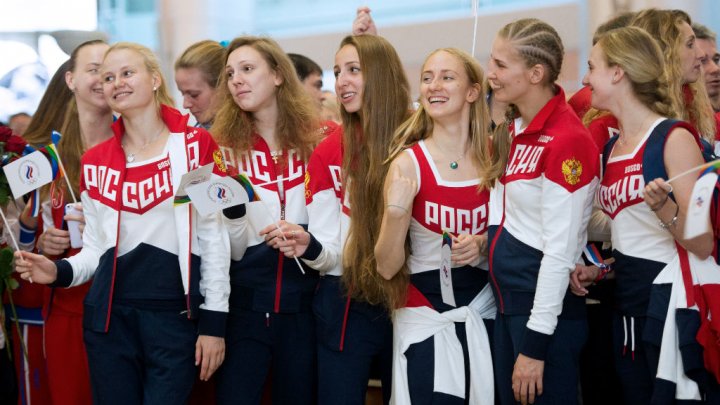 Russian Olympic team members prepare to depart for the Rio Games at Moscow's Sheremetyevo airport on July 28, 2016. Photo by AFP