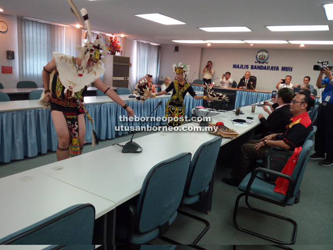 Orang Ulu dancers presenting a traditional dance during the courtesy call.