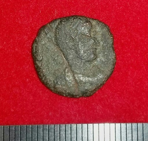 A 4th-century copper coin from ancient Rome has been unearthed in Japan's Okinawa island by researchers excavating Katsuren castle. - AFP Photo