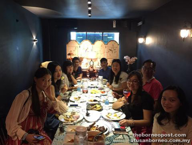 Hong Kong Airlines travel agents enjoying a local fusion meal.