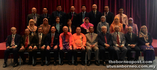 Entulu (seated centre) together with the newly elected chairmen of the Interview Board for EPP in Sarawak and others at Intan yesterday.