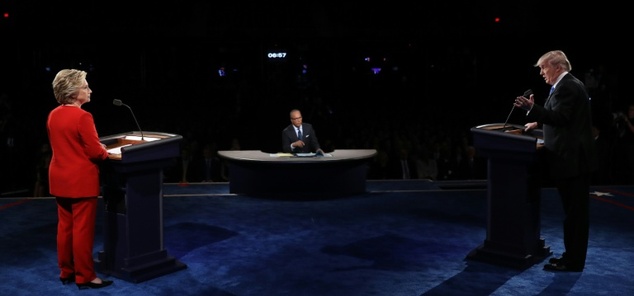 Democratic nominee Hillary Clinton and Republican nominee Donald Trump exchange views during the first presidential debate at Hofstra University in Hempstead, New York on Sept 26, 2016. AFP Photo