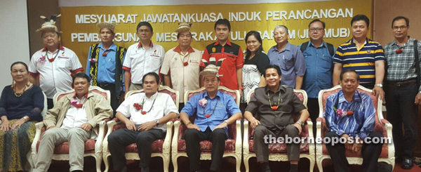 (Seated, from right) Kenyah paramount chief Temenggong Joseph Ngau Lian, Dennis, Gerawat, Anyi, Simpson and Long San community leader Lucia Paya with Kedaya Telang Usan Area Development Committee members.