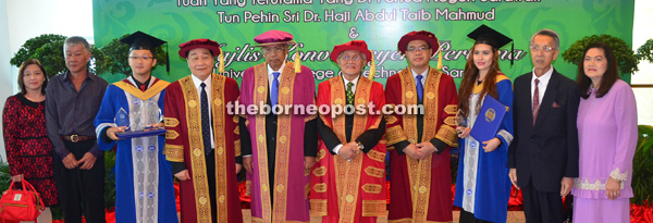 (From fourth left) Wong, Adenan, Taib and Hakim in group photo with Ting (third from left), Deenna (third from right) and their parents after the convocation ceremony.