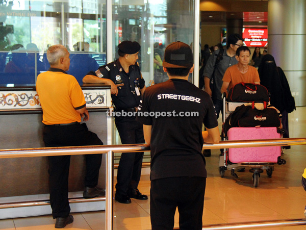 Passengers arriving at Kuching International Airport (KIA) yesterday. The Health Department has started its thermal screening at KIA as part of its efforts to prevent the spread of Zika virus to the state. — Photo by Chimon Upon