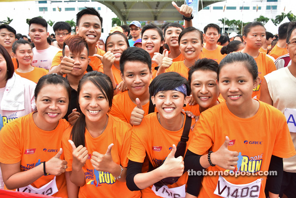 A group of youngsters from Rh Martenus, Sg Assan who never missed signing up for Borneo Post Run all set for the event at the starting point.