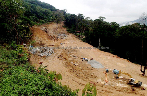 The hills in Lintang Bukit Jambul being cleared to pave way for a high-end property. — Bernama photo