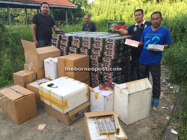 GOF personnel with the confiscated items taken from banks of Niah River. 