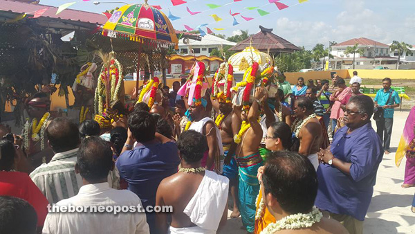 Devotees bring gifts and offerings to the temple for the ‘Nine Nights’ celebration.